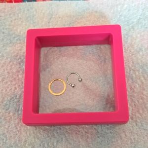 16 G Gold septum rings Unopened.  Unused